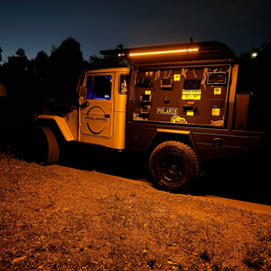 Polaris LED light bars, anti-bug amber, mounted on the inside of FJ45 canopy doors